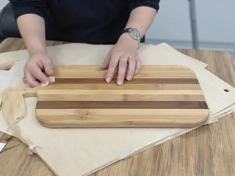 Cleaning wooden cutting board with lemon and salt